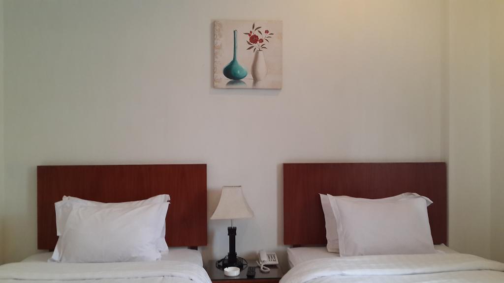 Kailani Inn Medan Quarto foto