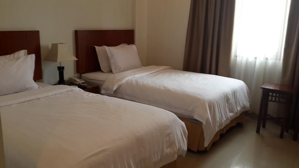 Kailani Inn Medan Quarto foto